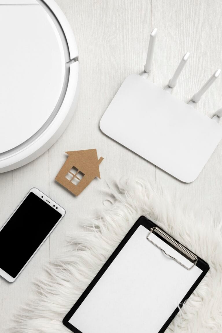 Router Wi-Fi Netia otoczony urządzeniami inteligentnego domu – widok z góry.